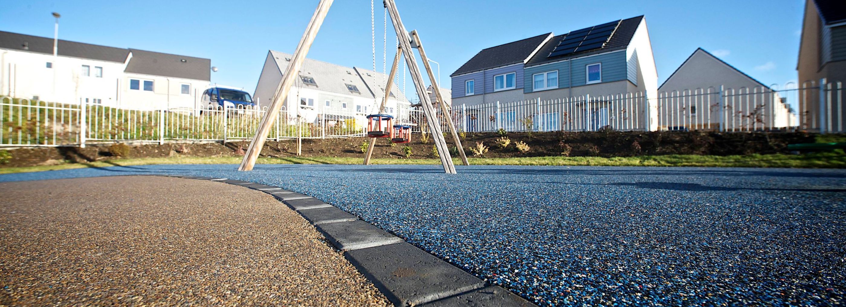 Rubber playground flooring in a house estate.